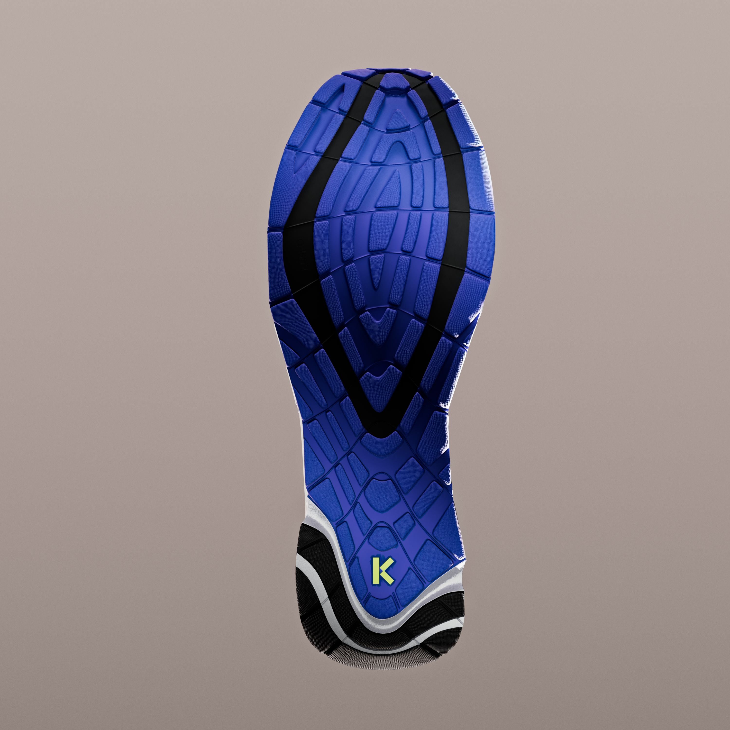 The shoe's outsole seen from below: a bright blue tread with a black central channel and a small K on the heel.