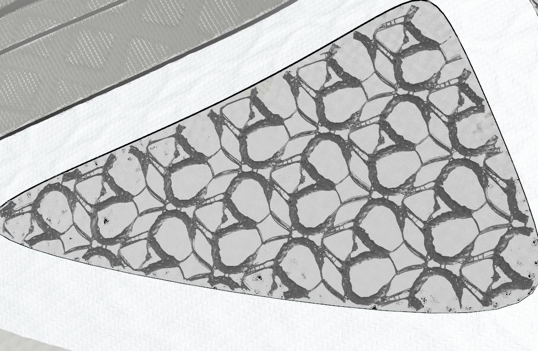 Grey untextured render of a white shoe panel filled with an interlocking woven pattern of fine threads.