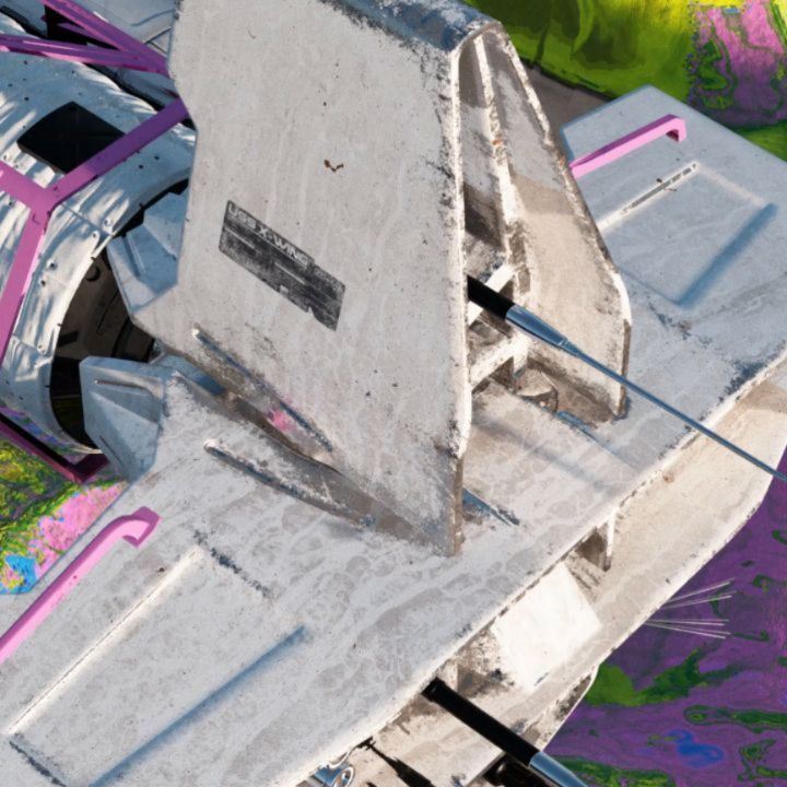 Close-up of a weathered white aircraft part trimmed with pink bars, resting on terrain textured in purple and green.